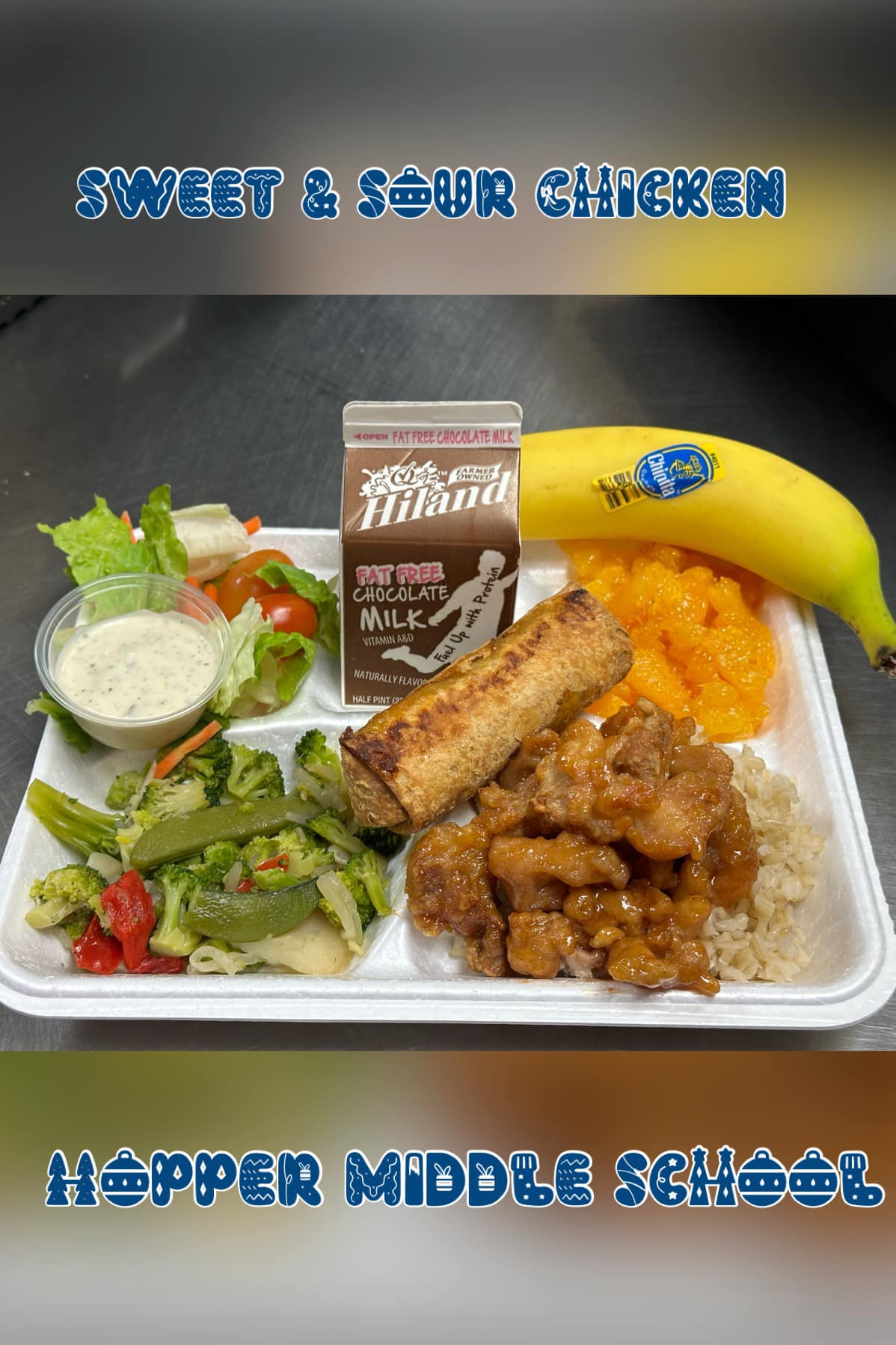 variety of food items on cafeteria tray