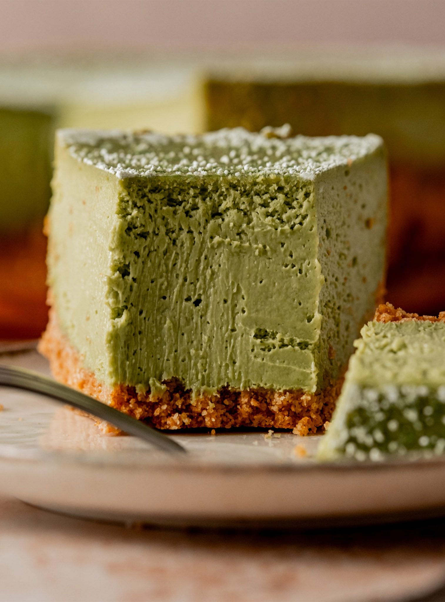 closeup of slice of Matcha Cheesecake