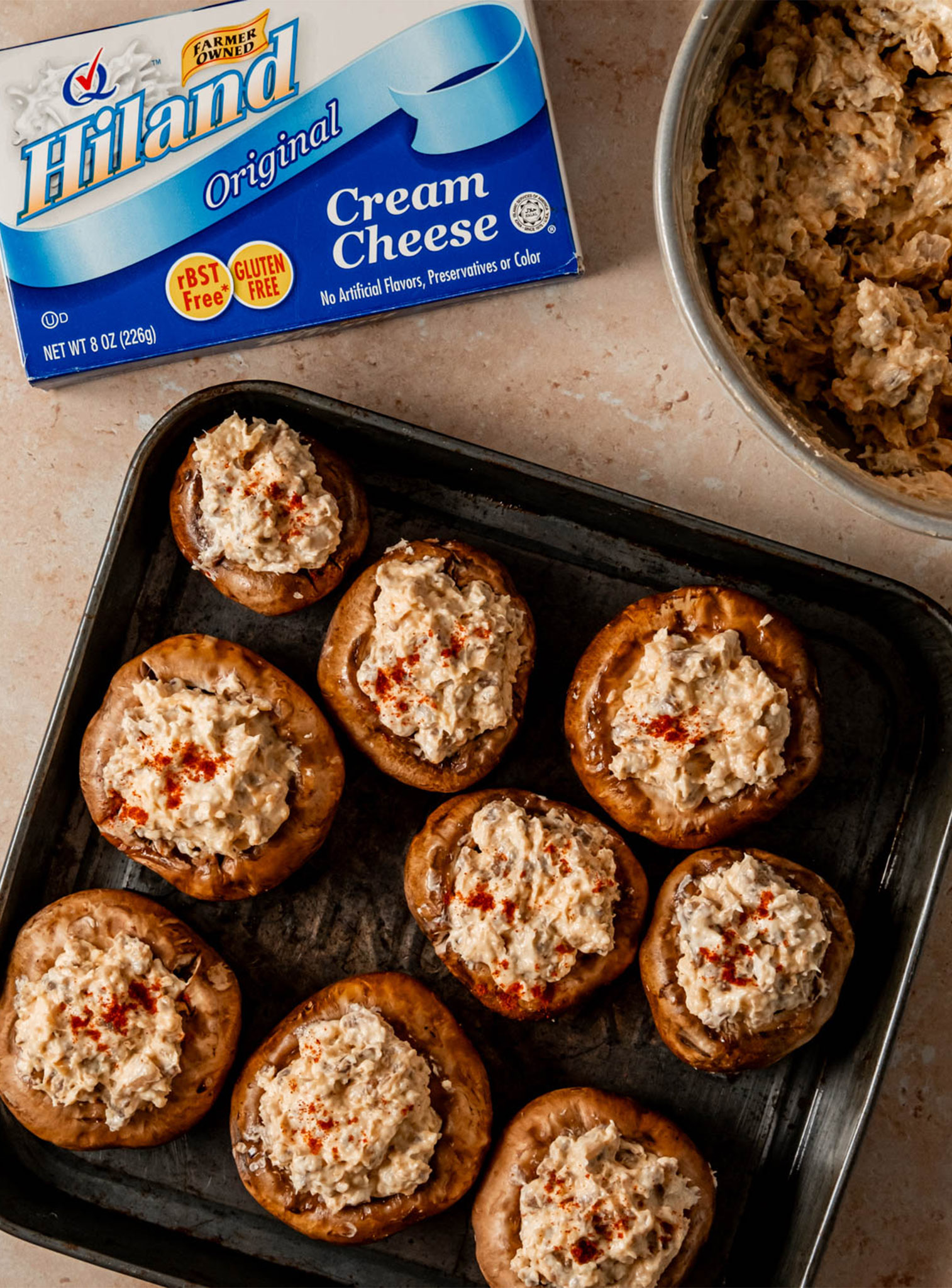 Sausage Stuffed Mushrooms on a metal baking tray