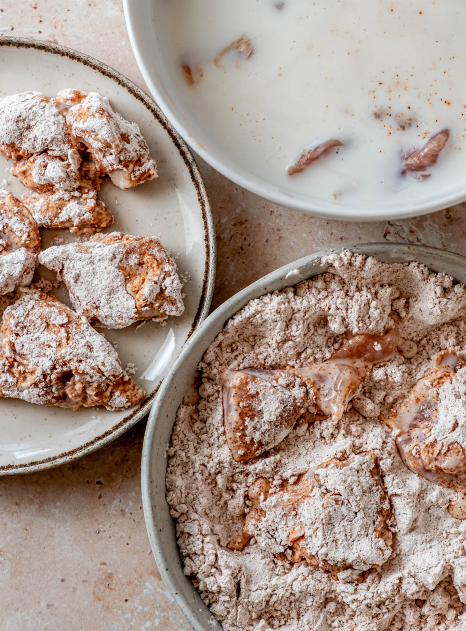 pieces of Sweet Tea Popcorn Chicken dipped in a buttermilk coating and flour